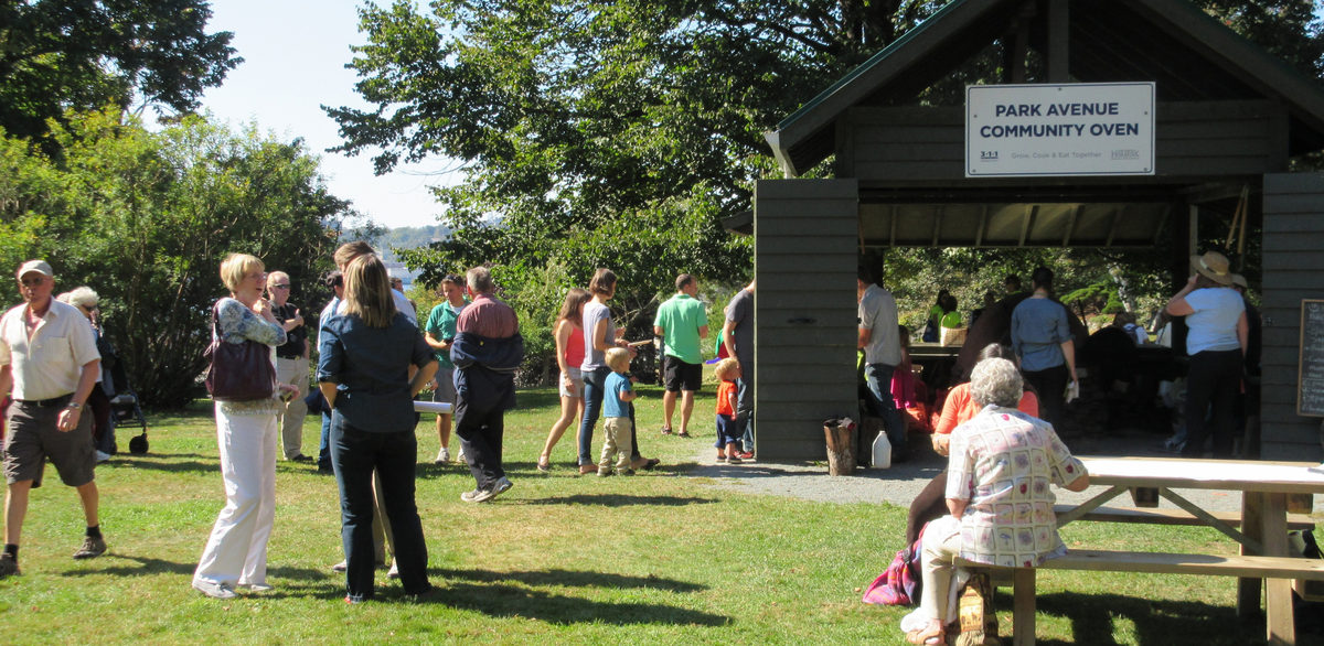 Park users of the Dartmouth Common enjoy the community oven