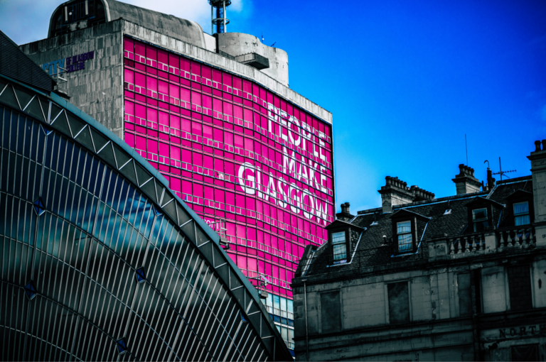 'People make Glasgow' written on the side of a building. COP26 Climate Summit Glasgow.