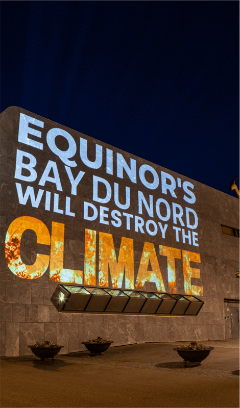 Projection against Equinor's Bay du Nord oil project in Stavanger, Norway at Equinor's AGM