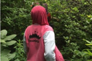 Kids walking through the woods. ECO Buddies, wild child, outdoor education program.