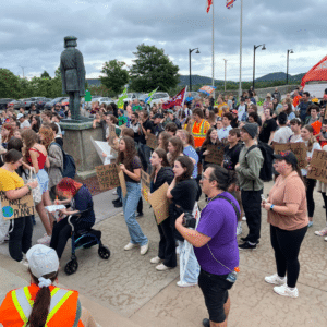 Youth protest against Bay du Nord. Bay du Nord reshape is a bad bet for the future of Newfoundland & Labrador. More about youth who want a different way forward than oil & gas pictured.