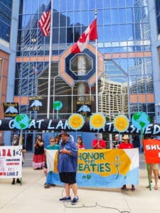 Minnesota and Wisconsin residents calling on Canada to retire the Enbridge Line 5 oil pipeline rally outside the Canadian consulate office.