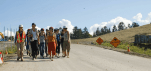 Youth in a construction zone walking towards the camera